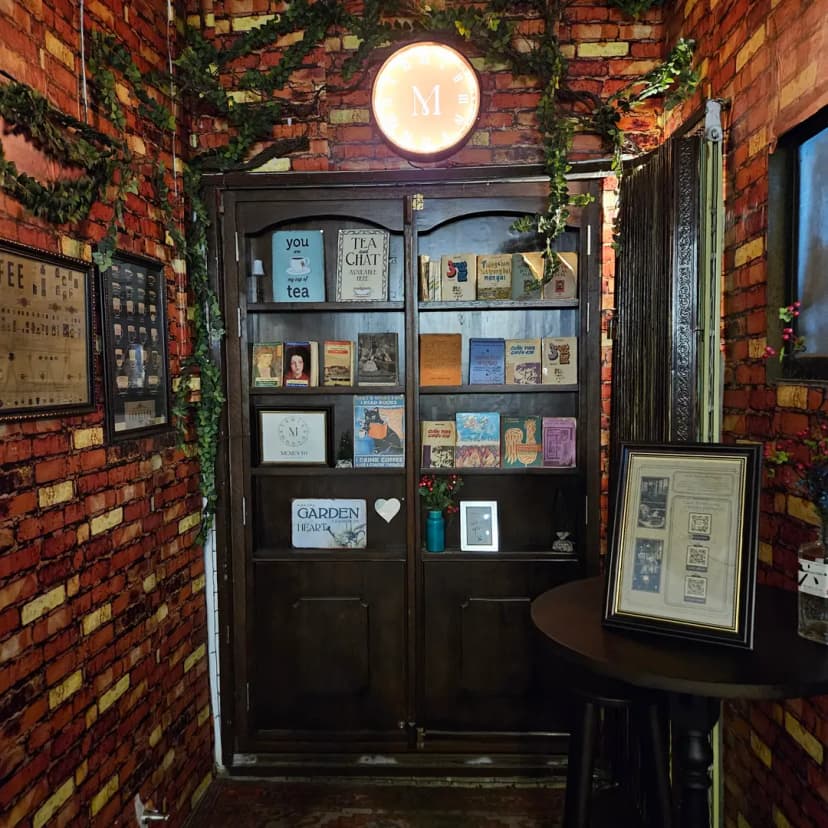 Secret bookshelf entrance at Memento Saigon