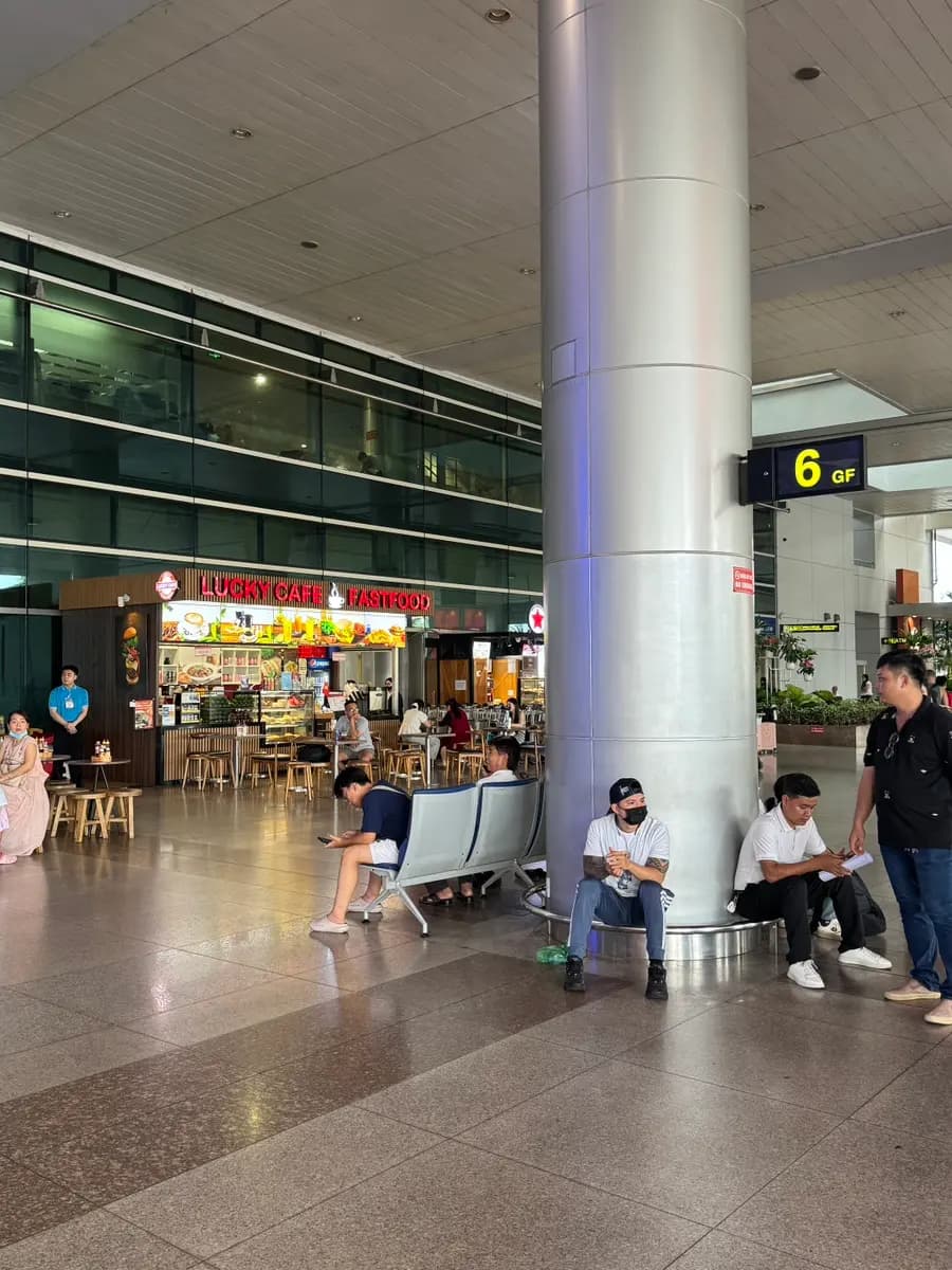 Grab สนามบินโฮจิมินห์ 2026: วิธีขึ้นรถและจุดจอดรับ