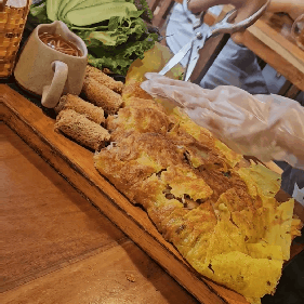 Crispy Banh Xeo with fresh vegetables