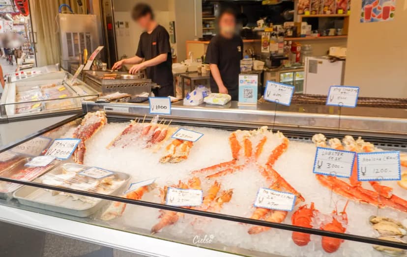 Fresh scallops and crab at Kuromon Market